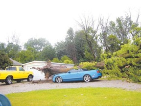 A severe storm caused extensive property damage to homes in Lambton Shores late last month. Although governments often offer compensation to victims of natural disasters, the payment do not usually cover the total cost of repairs. (LYNDA HILLMAN-RAPLEY, QMI Agency files)