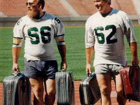 Former Eskimos Hec Pothier and the late Bill Stevenson, shown perparing for a two-game road trip in 1988, are being inducted by the team onto the Wall of Honour. (Edmonton Sun file)