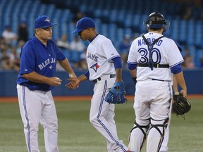 Blue Jays manager John Gibbons takes the ball from starting pitcher Marcus Stroman during MLB action against the Rays in Toronto on Friday, Aug. 22, 2014. (Dave Thomas/Toronto Sun/QMI Agency)