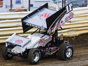 Kraig Kinser wheels the No. 11k car for his Steve Kinser Racing, the team owned by his father. Steve, meanwhile, drives the No. 11 for Tony Stewart Racing. (Codie McLachlan, Edmonton Sun)