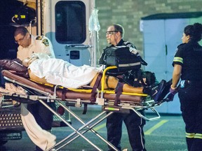 A man was rushed to hospital with several stab wounds he suffered at an address on Eastbourne Drive in Brampton, near Torbram Rd. and Steeles Ave. on Aug. 23, 2014. (Victor Biro/Special to the Toronto Sun)