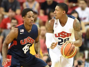 DeMar DeRozan #45 of the 2014 USA Basketball Men's National Team guards Bradley Beal #28 of the 2014 USA Basketball Men's National Team during a USA Basketball showcase at the Thomas & Mack Center on August 1, 2014 in Las Vegas, Nevada.  (Ethan Miller/Getty Images/AFP)
