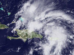 This National Oceanic and Atmospheric Administration (NOAA) was taken by the GOES East satellite at 1745Z on August 22, 2014. Shower and thunderstorm activity has increased during the past few hours in association with a small area of low pressure located just north of the Mona Passage between Puerto Rico and the Dominican Republic. AFP PHOTO/NOAA/HANDOUT