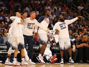 Team USA celebrates a score against the Dominican Republic during their game at Madison Square Garden on August 20, 2014 in New York City.  Al Bello/Getty Images/AFP