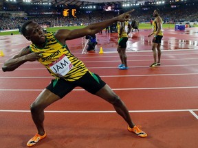 Jamaica's Usain Bolt poses after Jamaica won the men's 4x100m relay final at the 2014 Commonwealth Games in Glasgow, Scotland, August 2, 2014. REUTERS/Suzanne Plunkett