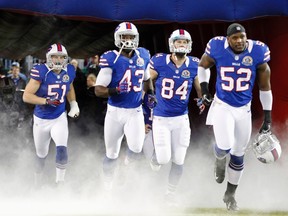 The Buffalo Bills take the field before their NFL football game against the Seattle Seahawks in Toronto, December 16, 2012. (REUTERS/Mark Blinch)