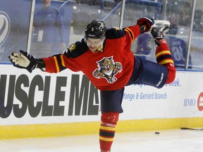 Aaron Ekblad of the Florida Panthers does a figure skating move on Aug. 23, 2014 for an upcoming promotional video. Thirty-three of the top NHL prospects/rookies were at the Mattamy Athletic Centre in Toronto for the 2014 NHLPA Rookie Showcase.(VERONICA HENRI/Toronto Sun)