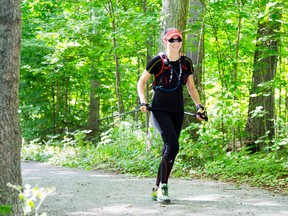 Rhonda-Marie Avery runs a length of the Bruce Trail that runs through Grimsby and Beamsville on Thursday, August 21, 2014. Avery is runinng the trail end-to-end and raising money for the organization Achilles Canada. (Julie Jocsak/  QMI Agency)