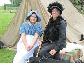 Lauren Gough, left, as Jane MacDonald, and Dawne Mudford, as the woman from the long, low house down the road, helped share the tale of the Baldoon Mystery at the Selkirk History Faire. Don Robinet/QMI Agency