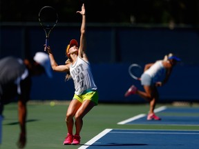 Eugenie Bouchard works on her serve during a practice session at the Billie Jean King Tennis Center in Flushing Meadows, N.Y., on Sunday. (AFP)