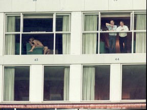 A couple (the ones on the left) put themselves on display in a Renaissance hotel window during a Blue Jays game a few years ago at the Rogers Centre. Sex in the window during Jays games was a common happening when the club was in the playoffs and Mike Rutsey wonders if that pasttime should return? (Toronto Sun files)