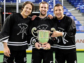 Brandon Montour, left, Joel Shepley and Jordan Durston of the Six Nations Arrows celebrate their Minto Cup triumph Saturday in Langley, B.C. (WARD LAFORME JR./Photo courtesy of Brantford Expositor)