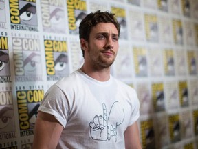 Cast member Aaron Taylor-Johnson poses at a press line for the movie "Avengers: Age of Ultron" during the 2014 Comic-Con International Convention in San Diego, California July 26, 2014. (REUTERS/Mario Anzuoni)