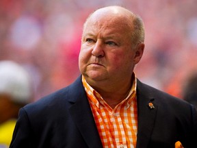 B.C. Lions president and CEO Dennis Skulsky watches his team take on the Saskatchewan Roughriders during the first half of their CFL football game in Vancouver, British Columbia, August 24, 2014. (REUTERS)