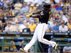 Pittsburgh Pirates right fielder Gregory Polanco (25) hits a solo home run against the Los Angeles Dodgers during the third inning at PNC Park. (Charles LeClaire-USA TODAY Sports)