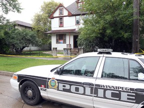 Winnipeg police have yet to make an arrest in the city's latest homicide, which happened at this home on Austin Street North. (Brian Donogh/Winnipeg Sun file photo)