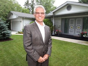 Gary Bachman of Century 21 Bachman and Associations is seen in front of a listing at 435 Park Blvd. E in Tuxedo that he feels is a bargain of a different kind. (Kevin King/Winnipeg Sun)