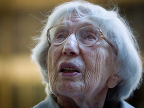 Miriam Moskowitz talks to the media after a status conference in her case outside the Manhattan Federal Court building in the Manhattan borough of New York August 25, 2014. The 98-year-old retired New Jersey math teacher implicated in a Cold War atomic espionage case has asked a U.S. judge to throw out her 1950 conviction and fix a McCarthy-era "miscarriage of justice" of which she is the last surviving victim. REUTERS/Carlo Allegri