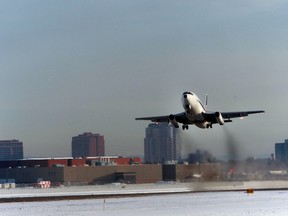 The Alberta Aviation Museum 737 takes off from the Edmonton City Centre Airport for the last time in Edmonton, Alta., on Friday, Nov. 29, 2013. Perry Mah/Edmonton Sun