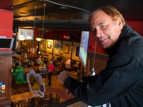 Tim Best, owner of Friday Knight Lights bar on Richmond St., says the business is in good shape, ?so it?s a good time to sell.? (MIKE HENSEN, The London Free Press)