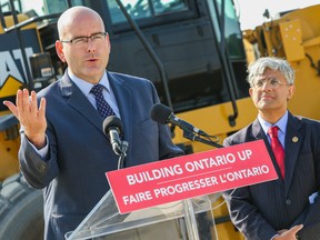 Minister of Transportation Steven Del Duca, joined by  Etobicoke North MPP Shafiq Qaadri, announces improvements along Hwy. 427 on Tuesday, Aug. 26. (DAVE THOMAS/Toronto Sun)