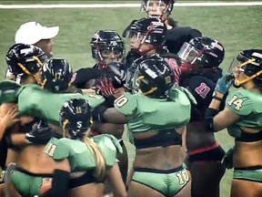 The Atlanta Steam (black) and Jacksonville Breeze (green) faced each other in a Legends Football League playoff game on Aug. 16, 2014. (LFL/Youtube.com)