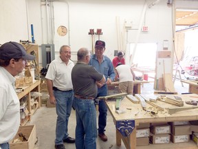 Minister Oberle visits the Piikani Employment Services on Wednesday, August 20. L to R: Allan Pard, senior advisor with Aboriginal Relations and Elder from the Piikani Nation, Peace River MLA and Aboriginal Relations Minister Frank Oberle, Donavon Young, deputy minister of aboriginal relations and Jim Swag with Piikani Employment Services. Photo submitted.