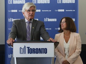 Toronto city manager Joe Pennachetti speaks to the media about his retirement along with deputy city manager Brenda Patterson, who will also be leaving her position, at Toronto City Hall Tuesday August 26, 2014. (Jack Boland/Toronto Sun)