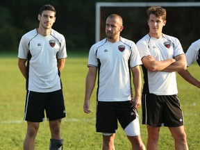 Ottawa Fury FC defender Drew Beckie (left), who was sporting a soft cast at the team's community practice in Kanata on Tuesday night, is expected to miss two to four weeks with an ankle injury suffered last weekend in Fury's 2-1 win against Indy Eleven. (Chris Hofley/Ottawa Sun)