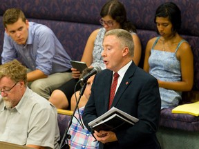 Fanshawe College president Peter Devlin, at top, speaks to council?s corporate service committee before council voted  to bring discussion of partly funding Fanshawe?s move into the former Kingsmill?s store back to council?s next meeting. (CRAIG GLOVER, The London Free Press)