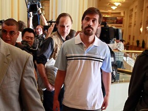 U.S. journalist James Foley (R) arrives with fellow reporter Clare Gillis (not pictured), after being released by the Libyan government, at Rixos hotel in Tripoli, in this picture taken May 18, 2011. Islamic State militants have posted a video that purported to show the beheading of Foley in revenge for U.S. air strikes in Iraq, prompting widespread revulsion that could push Western powers into further action against the group. Foley, 40, was kidnapped on November 22, 2012, in northern Syria, according to GlobalPost. The video was posted after the U.S. resumed air strikes in Iraq in August 2014 for the first time since the end of the U.S. occupation in 2011. He had earlier been kidnapped and released in Libya. (REUTERS/Louafi Larbi)