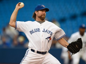 Toronto Blue Jays starting pitcher R.A. Dickey throws against the Boston Red Sox at the Rogers Centre in Toronto, Aug. 26, 2014. (PETER LLEWWLLYN/USA Today)