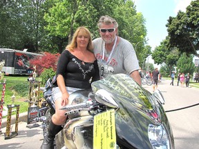 Blair Andrews/Chatham This Week
Andy Forrest, right, and his partner Darlene Vautour of Hamilton turned a lot of heads at BikeFest in Chatham on Aug 23. The 2001 Suzuki Hayabusa sports a custom paint job based on 'The Resident Evil' series of films and video games.