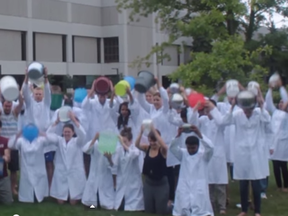 Students from the UOttawa medical school take the ALS Ice Bucket Challenge in this screengrab from a YouTube video. (Screengrab via YouTube)