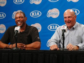 Los Angeles Clippers' new owner Steve Ballmer (R) speaks at a news conference with coach Doc Rivers. (REUTERS/Lucy Nicholson)