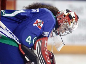 Columbus Cottonmouths goaltender Shannon Szabados reacts after a Knoxville Ice Bears score in the first period in Columbus, Georgia, March 15, 2014. (REUTERS/Tami Chappell)