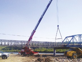 The new span for the Highway 547 bridge was put in place Tuesday, Aug. 26. Photo courtesy of Alberta Transportation
