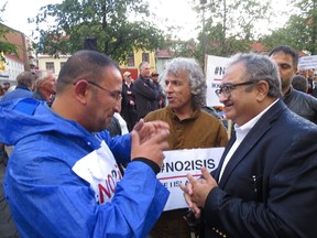 Tarek Fatah chats with anti-ISIS protesters in Norway.