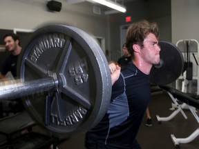 Kingston Frontenacs defenceman Roland McKeown works out in the Frontenacs dressing room at the Rogers K-Rock Centre on Wednesday. (IAN MACALPINE/THE WHIG-STANDARD)