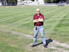 Wallaceburg District Secondary School principal Rob Lee is excited about the school receiving a $2.25 million capital funding grant from the Ministry of Education that was announced Wednesday. Some of the money will be used to replace the existing gravel track Lee is standing on that is overgrown with weeds. The funding will also be used to construct a new fitness centre and outdoor area for Grade 7-8 students and redesign the library. (ELLWOOD SHREVE, The Daily News)