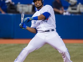 Blue Jays slugger Edwin Encarnacion reacts during an at-bat against the Red Sox at the Rogers Centre last night. (Ernest Doroszuk/Toronto Sun)