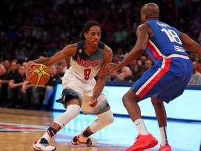 United States guard DeMar DeRozan (9) controls the ball against Dominican Republic forward James Maye (18) during an exhibition game. (USA Today Sports)
