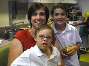 Julie Contini is grateful for the services her son Peter, 5, received from the Children's Treatment Centre. They and Peter's big brother, John, 7, attended a news conference at the centre Wednesday.
