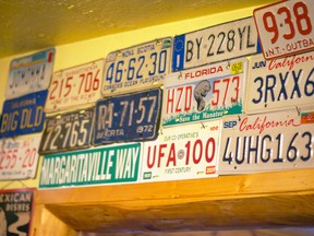 License plates from all over adorn the walls of the Twin Butte General Store. Greg Cowan photos/QMI Agency.