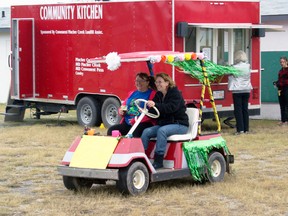 Members of the Lundbreck Citizens Council were buzzing around all day making sure everything ran smoothly. We caught a shot of them in action here in front of the Community Kitchen.