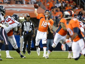Denver Broncos quarterback Peyton Manning (18) passes in the second quarter of a preseason game against the Houston Texans at Sports Authority Field at Mile High. (Ron Chenoy-USA TODAY Sports)