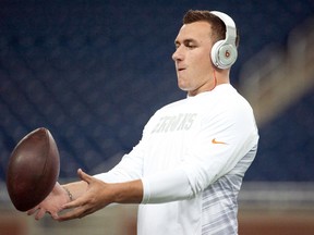 Cleveland Browns quarterback Johnny Manziel warms up before the game against the Detroit Lions at Ford Field on Aug 9, 2014; Detroit, MI, USA (Tim Fuller/USA TODAY Sports)