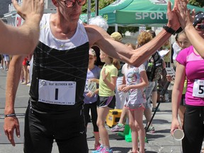 Kingston Olympian Dylan Wykes ran the Beat Beethoven's 8 km course twice, finishing with a time of 49:17, on June 1. (Julia McKay/The  Whig-Standard)