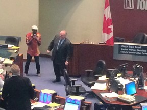 Mayor Rob Ford dances at city council with Jay Douglas of Jay Douglas and The All Stars on Thursday, August 28, 2014. (Don Peat/Toronto Sun)