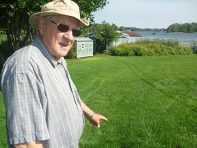 Mike Carty believes effluent from the septic bed of the Mill Bay Court seniors' apartments in Portland is running across his property and into Big Rideau Lake. (Paul Schliesmann/The Whig-Standard)